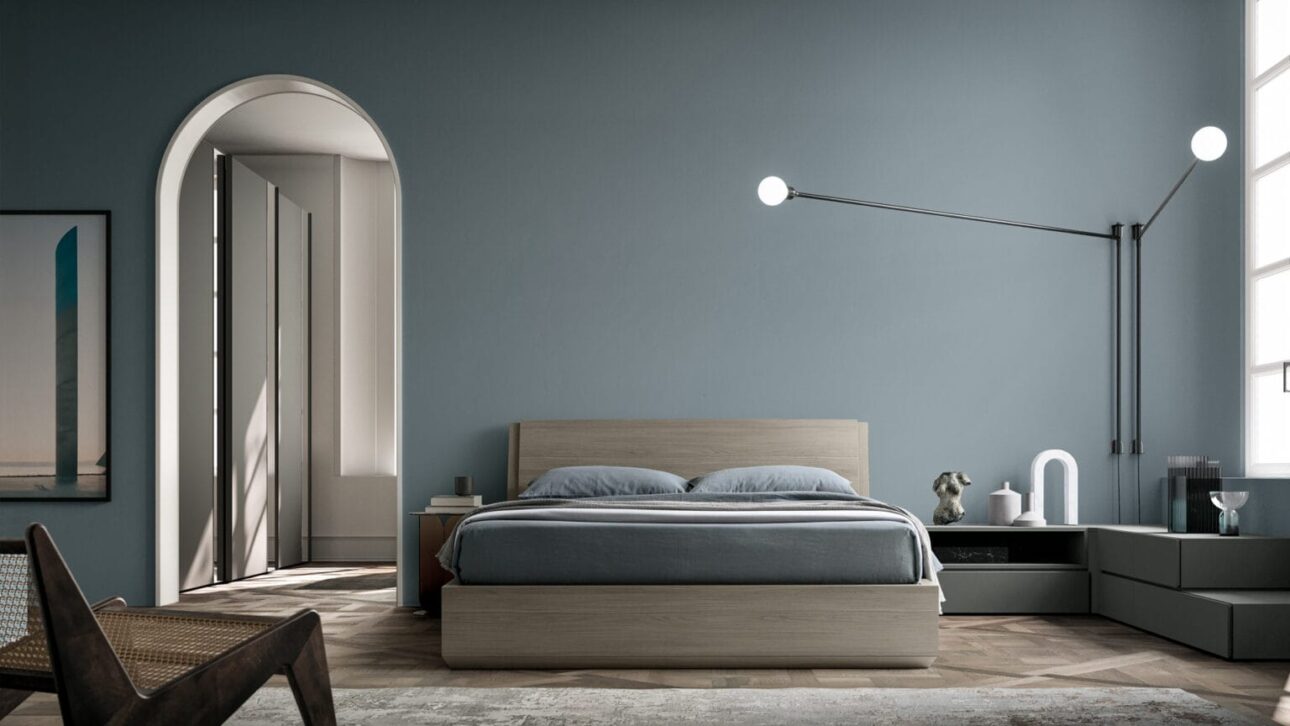 camera da letto moderna con parete blu azzurra