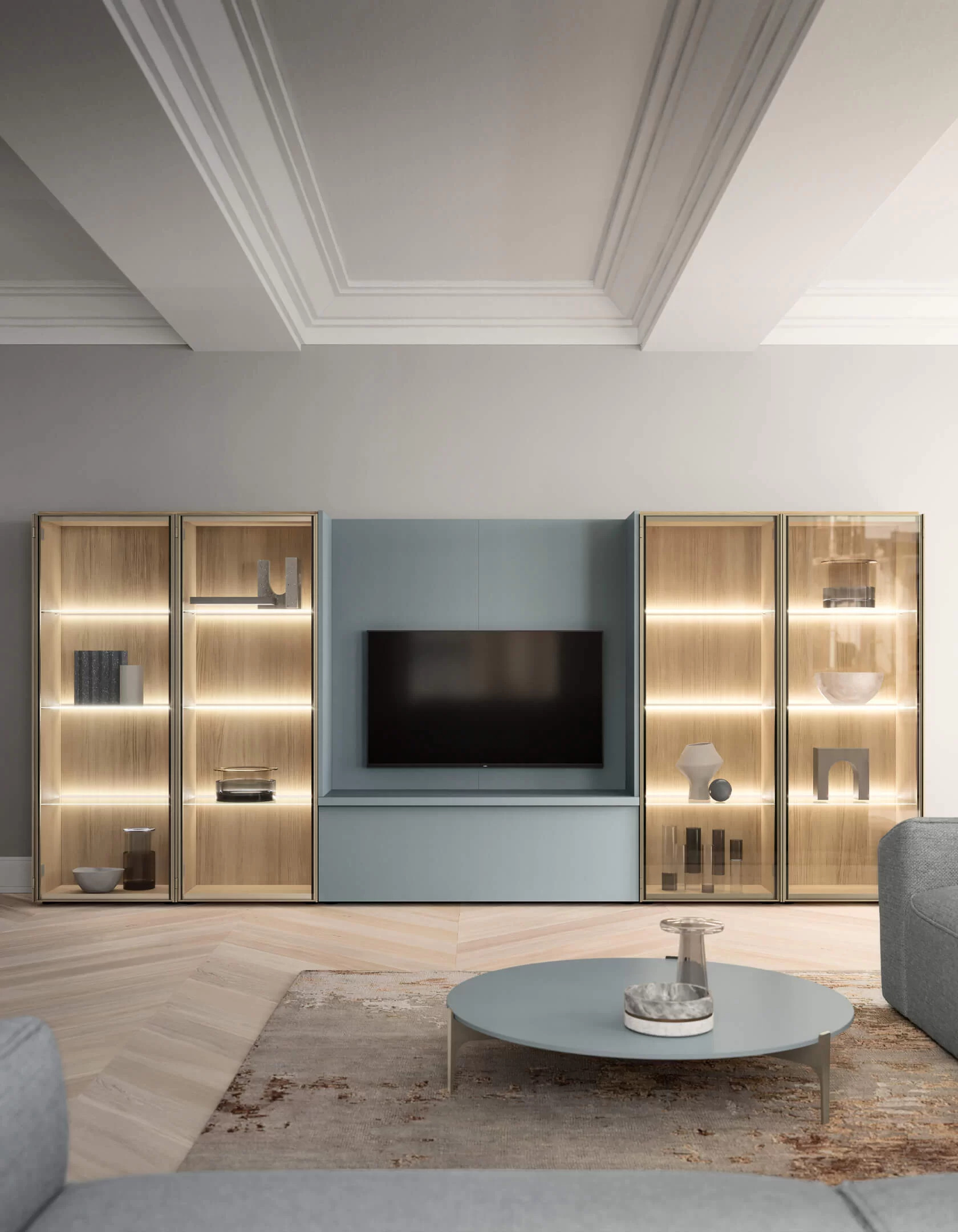 parete attrezzata del soggiorno con boiserie porta tv e vetrinette